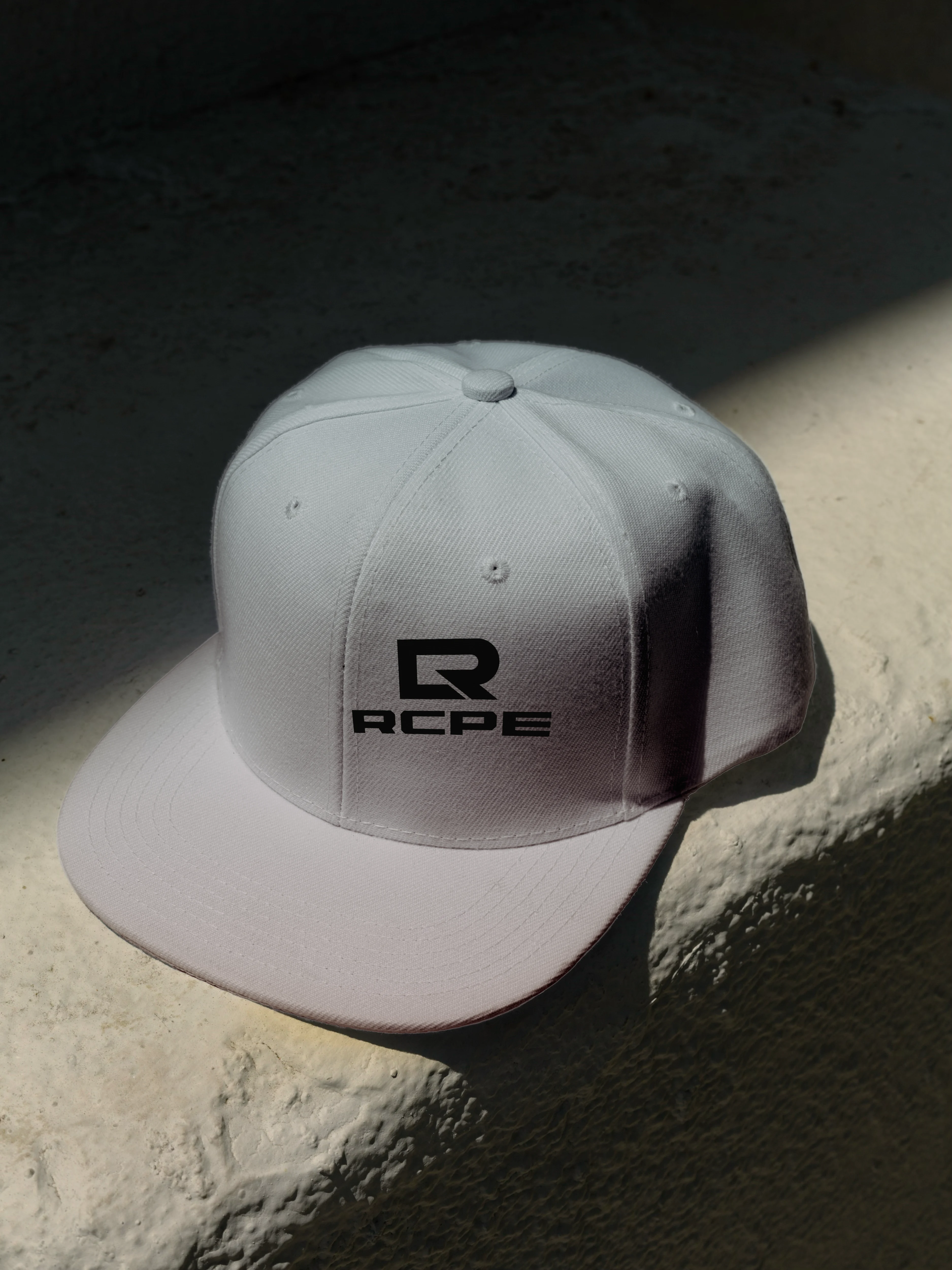 RCPE branded snapback hat